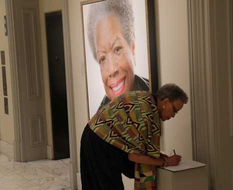 Maya Angelou signs guest book