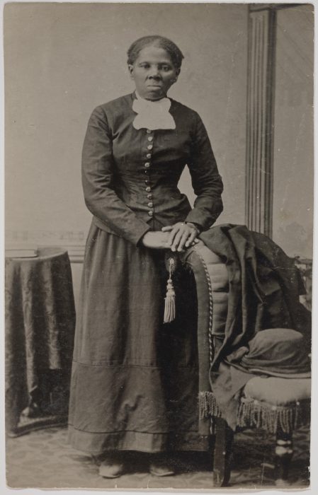 Tubman standing in dark suit