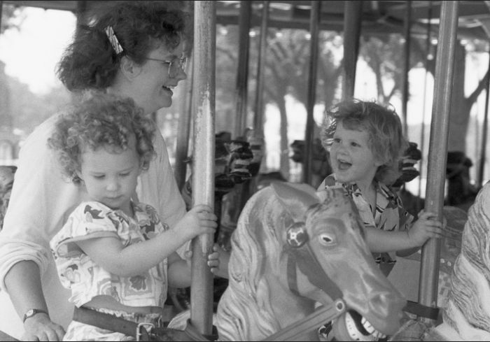 Kids riding the carousel