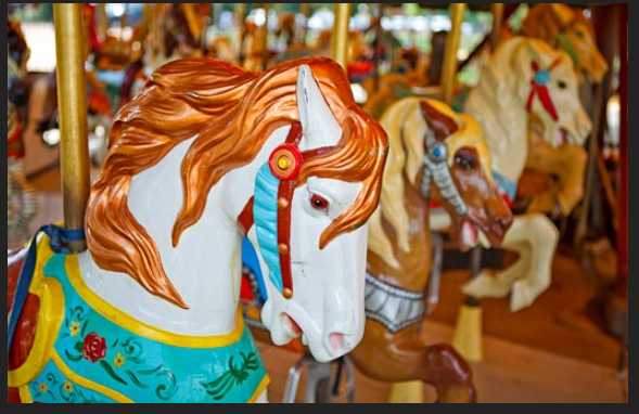 close-up of carousel horses