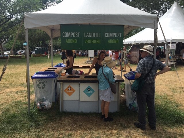 Composting booth and visitors