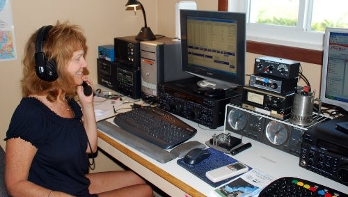 Woman operating ham radio station