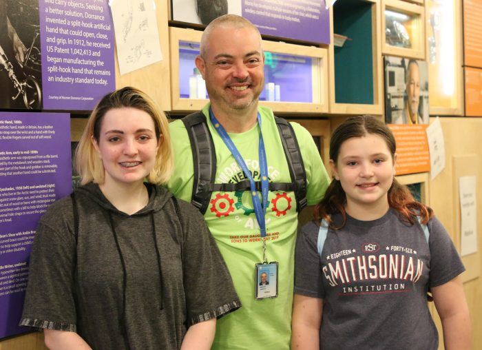 Jason Sawyer poses with his daughters