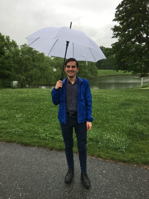 Phillips holding umbrella