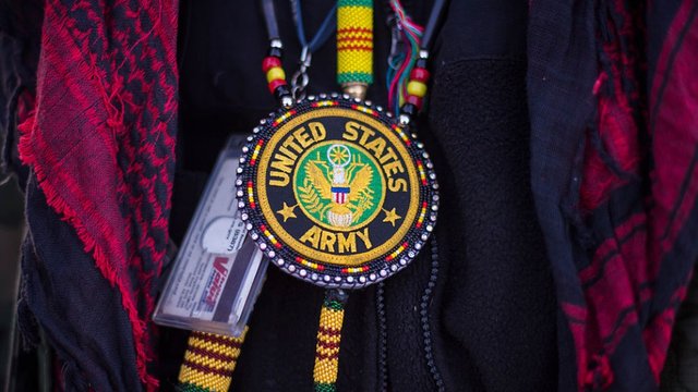 US Army medallion with Native American beading