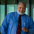 Lonnie Bunch in blue shirt at NMAAHC