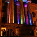 Museum facade lit with colored lights