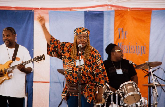 Woman singing on stage