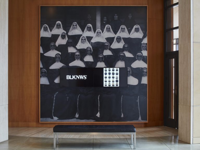 Art installation with photo of nuns