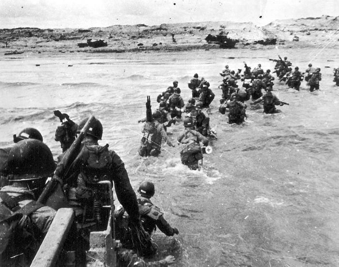 Soldiers landing at Normandy Beach