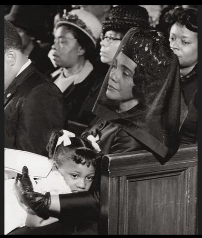 Mrs. King and young daughter at MLK funeral