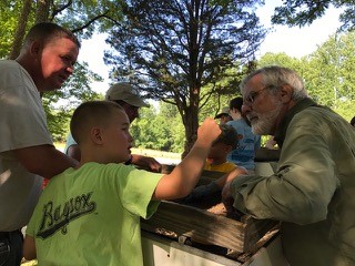 Jim Gibb working with young volunteers