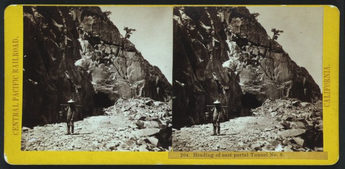 Old photo of Chinese man at railway site