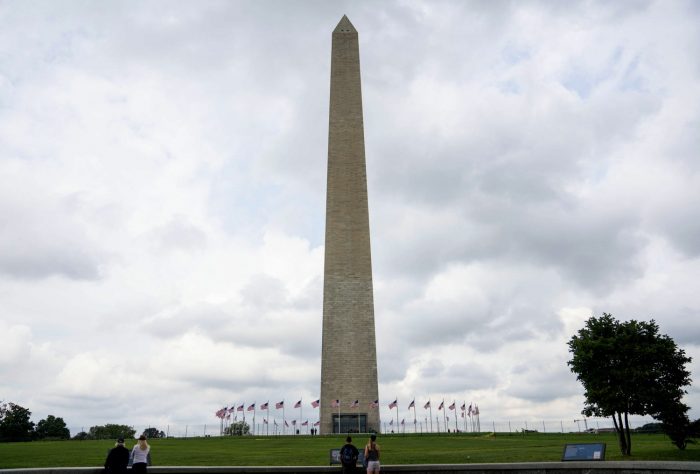 Washington Monument silhouetted against sky