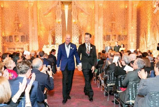 Couple walking down the aisle