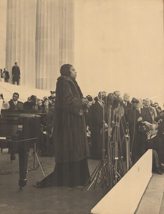 Anderson in fur coat singing on steps of Lincoln Memorial