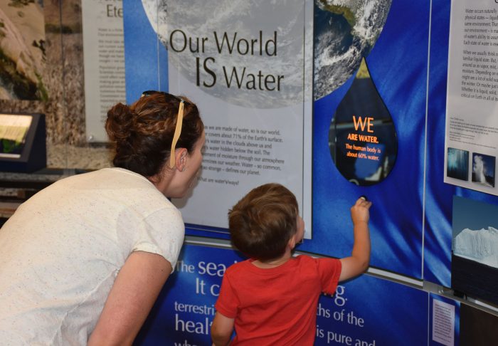 Child and mom at Water/Ways exhbition