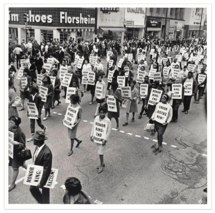Union workers marching with signs