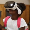 Child wearing VR headset