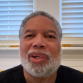 Screenshot of Lonnie Bunch in video message