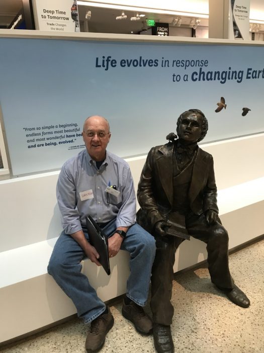 Dan Roe with statue of Darwin