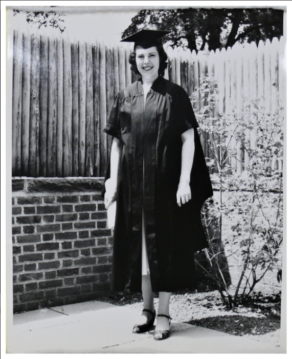 Black and white photo of young woman graduate