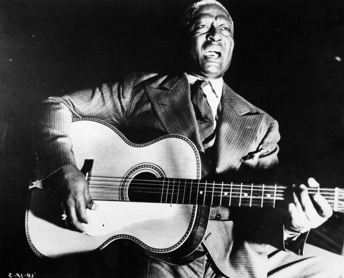 Black and white photo of Lead Belly