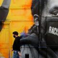 Resized and cropped mural Racism is a virus