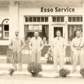 Cropped photo of Esso station staff