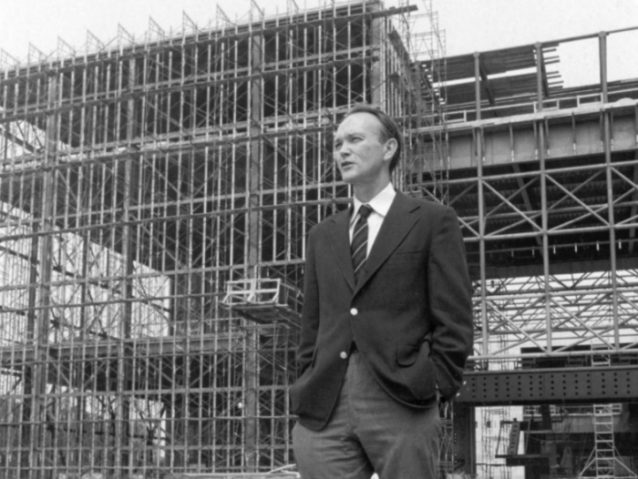 Collins stands in front of NASM construction job.