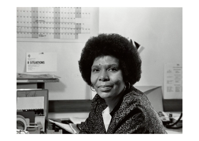 Black and white photo of Zora Martin Felton at her desk