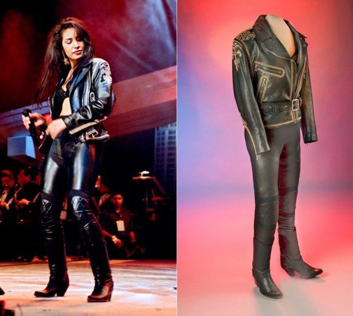 Selena wearing leather suit and suit on display