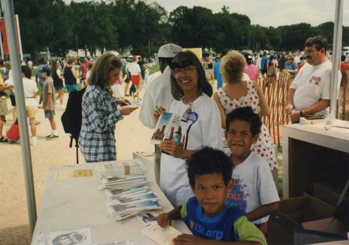 104. Wendy Lim (IRD) with her sons Alex and Chris celebrating the Smithsonian’s 150th anniversary, 1996
