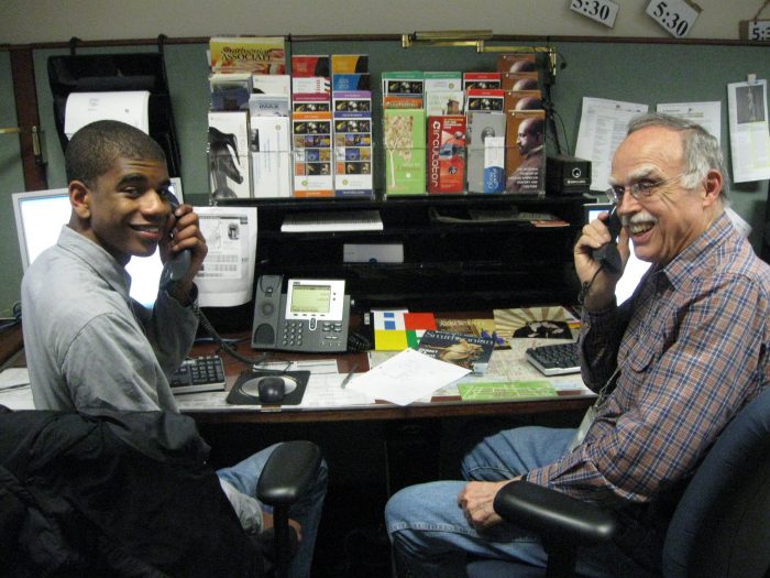 Volunteers Stephen McFadden and Wendall Morris answer calls in Telephone Services in the Smithsonian Castle.