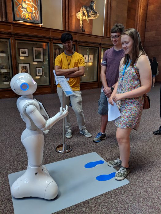 Teen Volunteers with Pepper the Robot