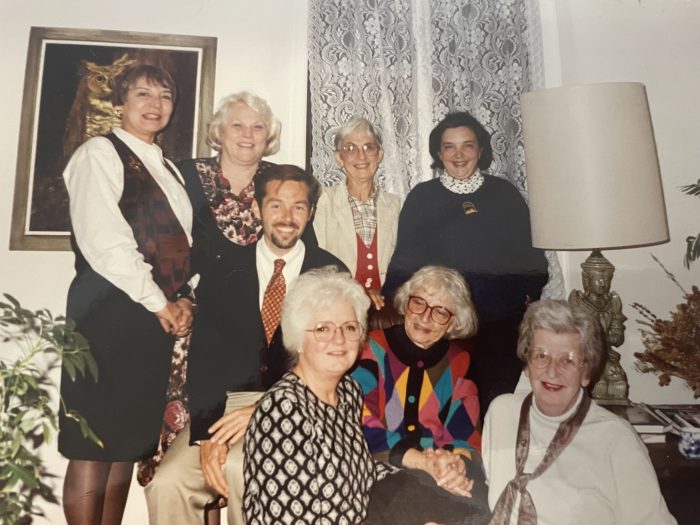 From left to right) Lois Brown, Ginger Craig, Maria Heasley, Lee Handley. (Middle) Bill Blandy. (Front row, left to right) Beegee Livsey, Katie Simpson, G. Van Poole