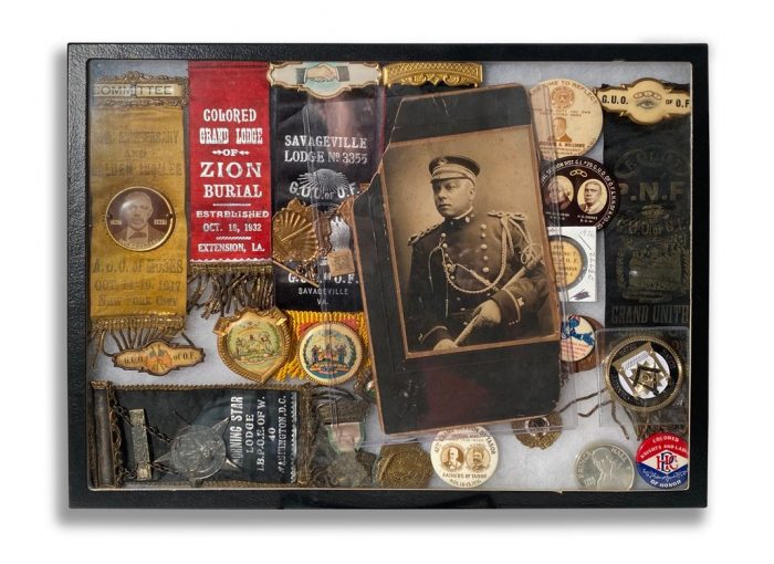 Case showing Meader's collection of African America Society memorabilia