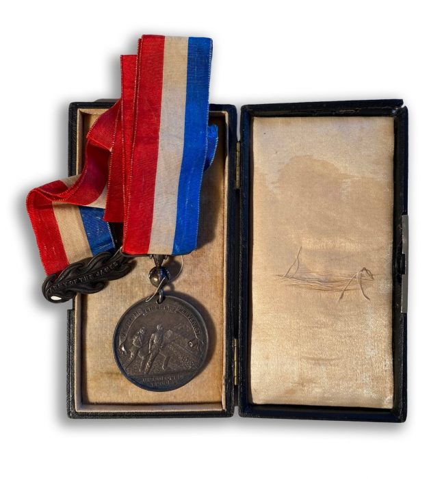 Butler medal with red, white and blue ribbon