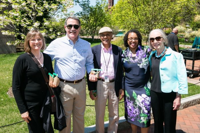 Sherri Wheeler with volunteers in Haupt Garden