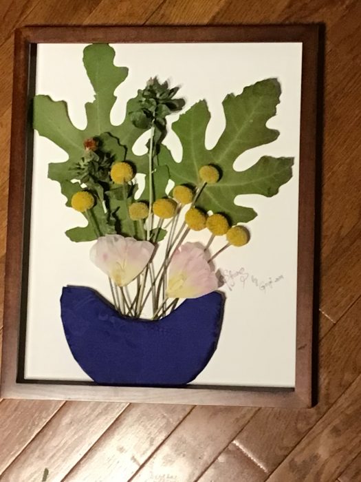 mixed media artwork depicting flower arrangement