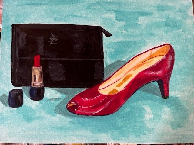 Painting of red shoe, lipstick, pocketbook