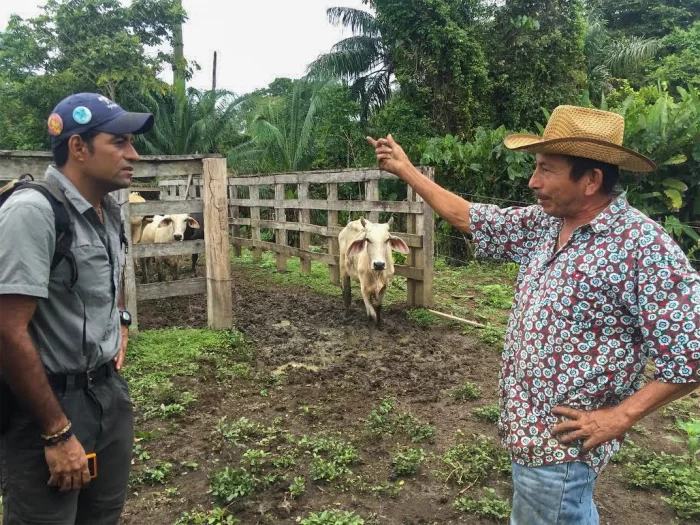 Yaguara talks with cattle farmer