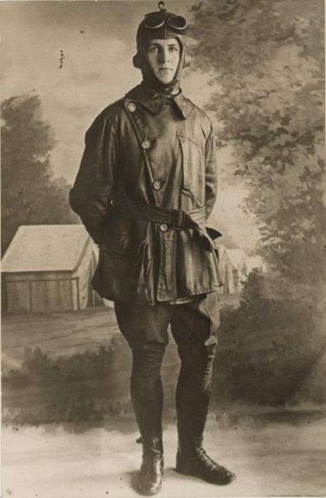 WWI-era pilot Frank Luke Jr poses against painted backdrop