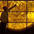 Man demonstrates solar wall at Cooper Hewitt Smithsonian Design Museum