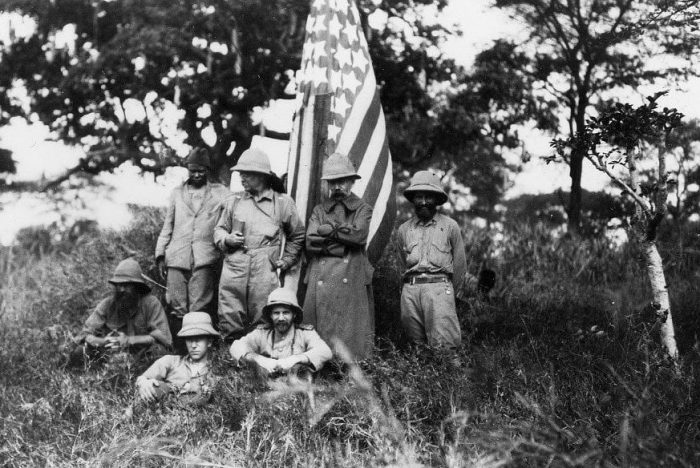 Theodore Roosevelt with American flag and comrade on African expedition in 1909
