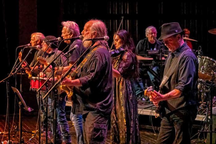 Band of bluegrass musicians on stage