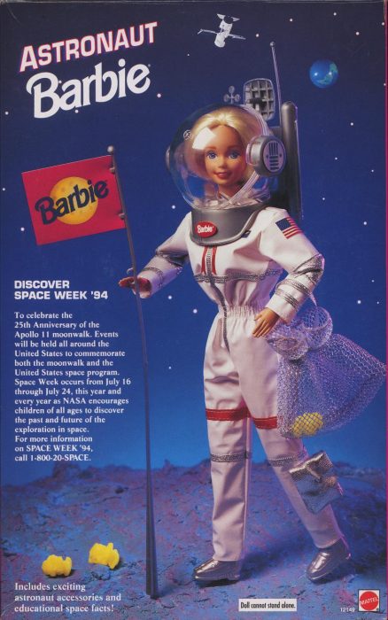 Astronaut Barbie box showing blonde Barbie doll in space suit, Barbie flag and ad copy promoting Space Week 1994