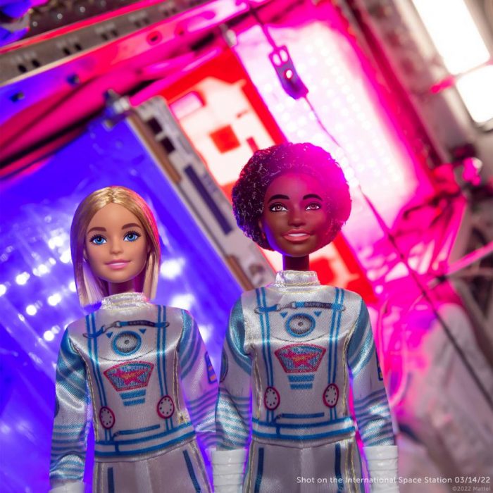 Blonde and African American Barbies on the International Space Station