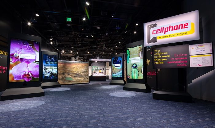 Exhibition Gallery entrance with cellphone screenshots displayed on panels