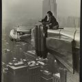 Black and white photo of Margaret Bourke-White atop the Chrysler Building